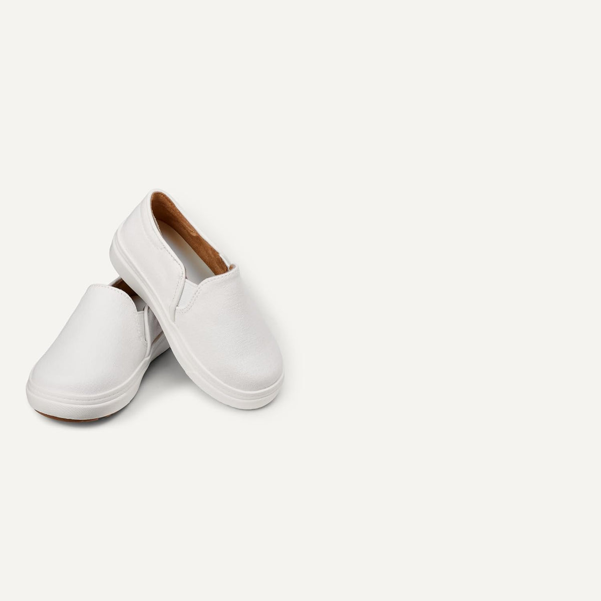Amazon Essentials Unisex Kids and Toddlers' Canvas Slip-on Sneakers